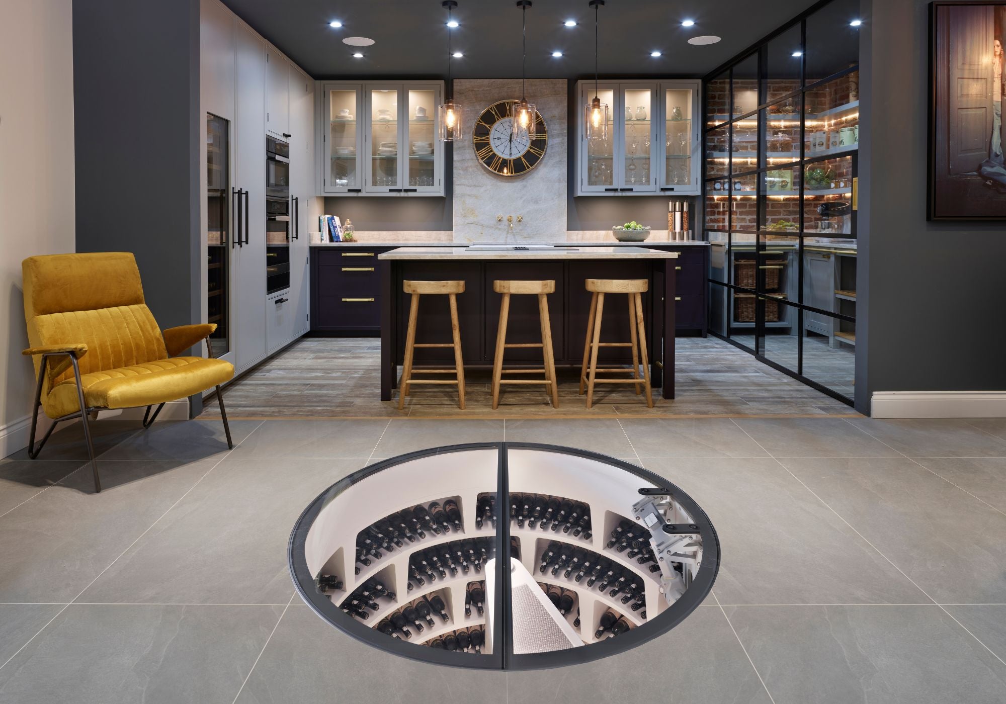 modern kitchen with spiral wine cellar - Genuwine Cellars Reserve