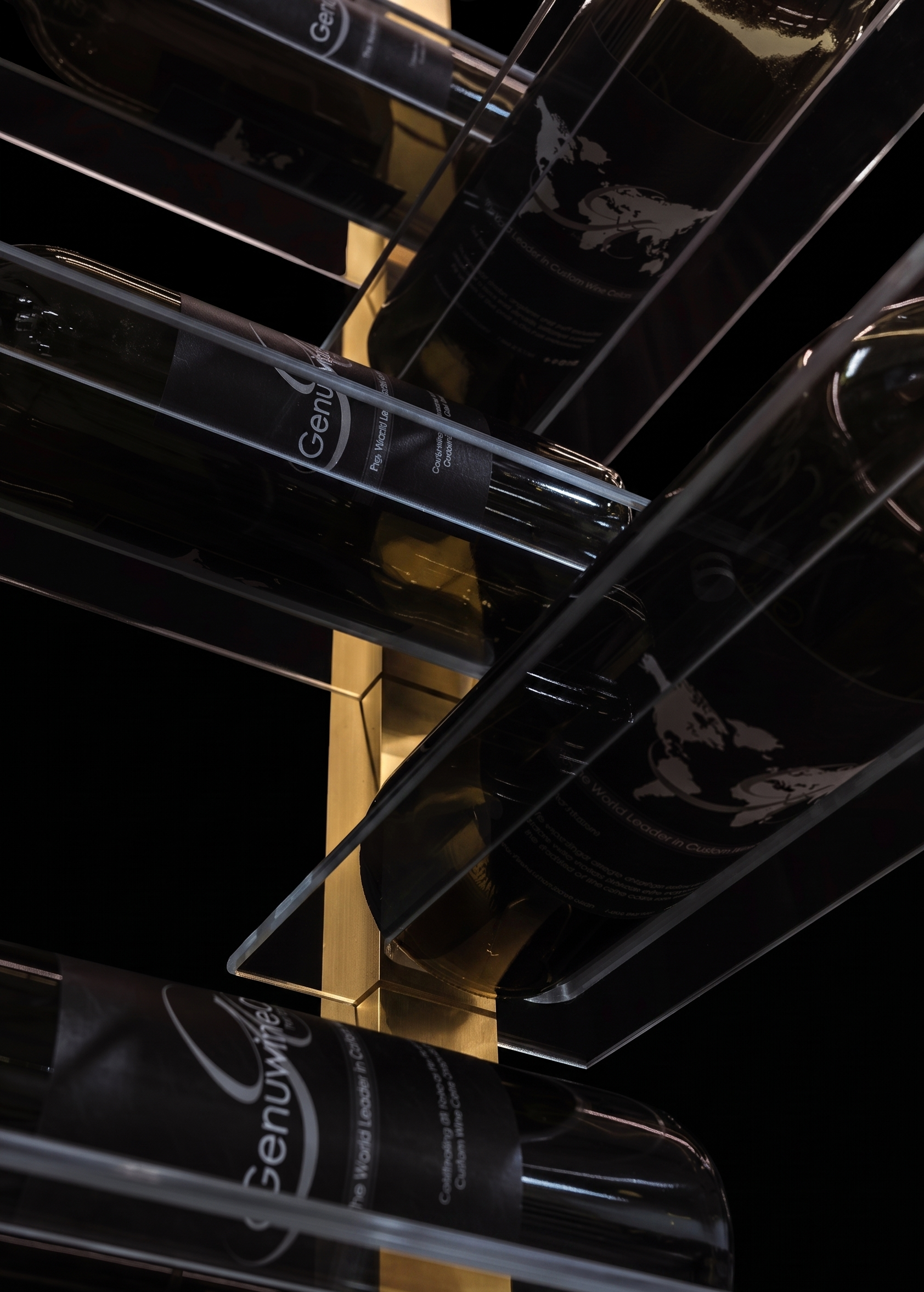 Clear acrylic shelves on a floating wine rack on a black background