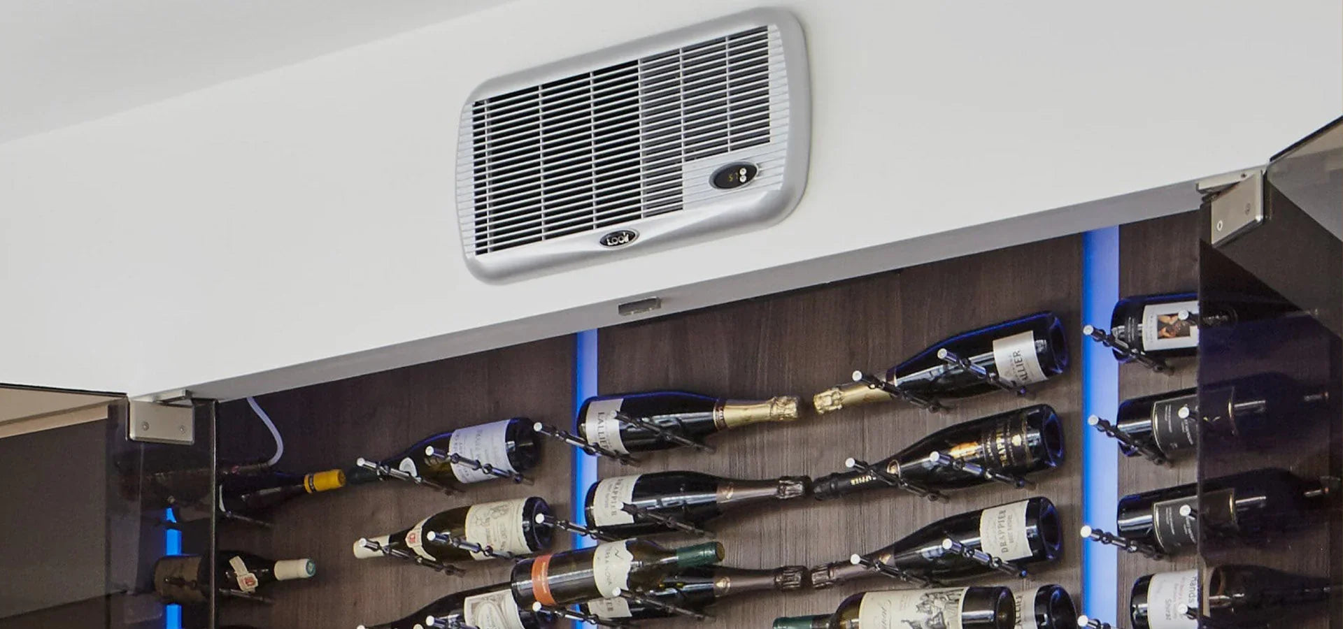 Modern wine cellar with wall-mounted cooling unit and horizontal wine bottle racks