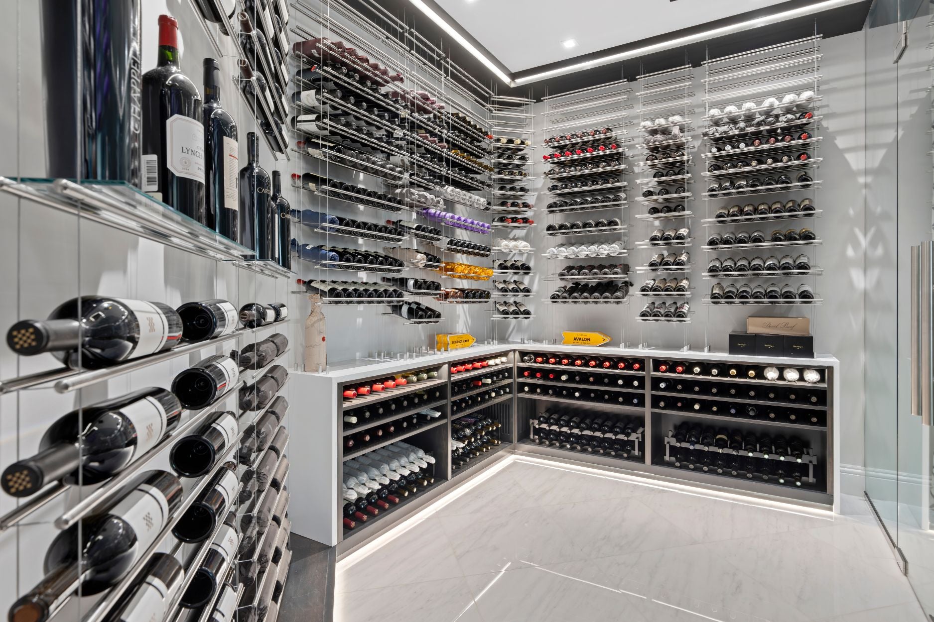 modern wine cellar with metal floating wine racks - Genuwine Cellars Reserve