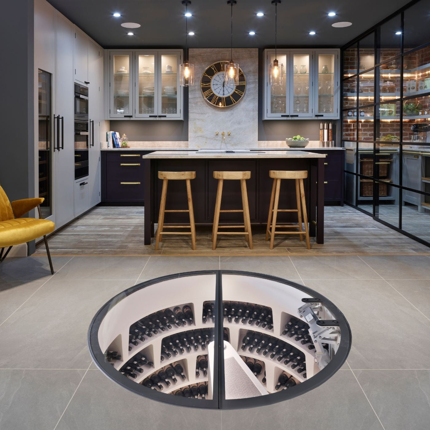 modern kitchen with spiral wine cellar - Genuwine Cellars Reserve