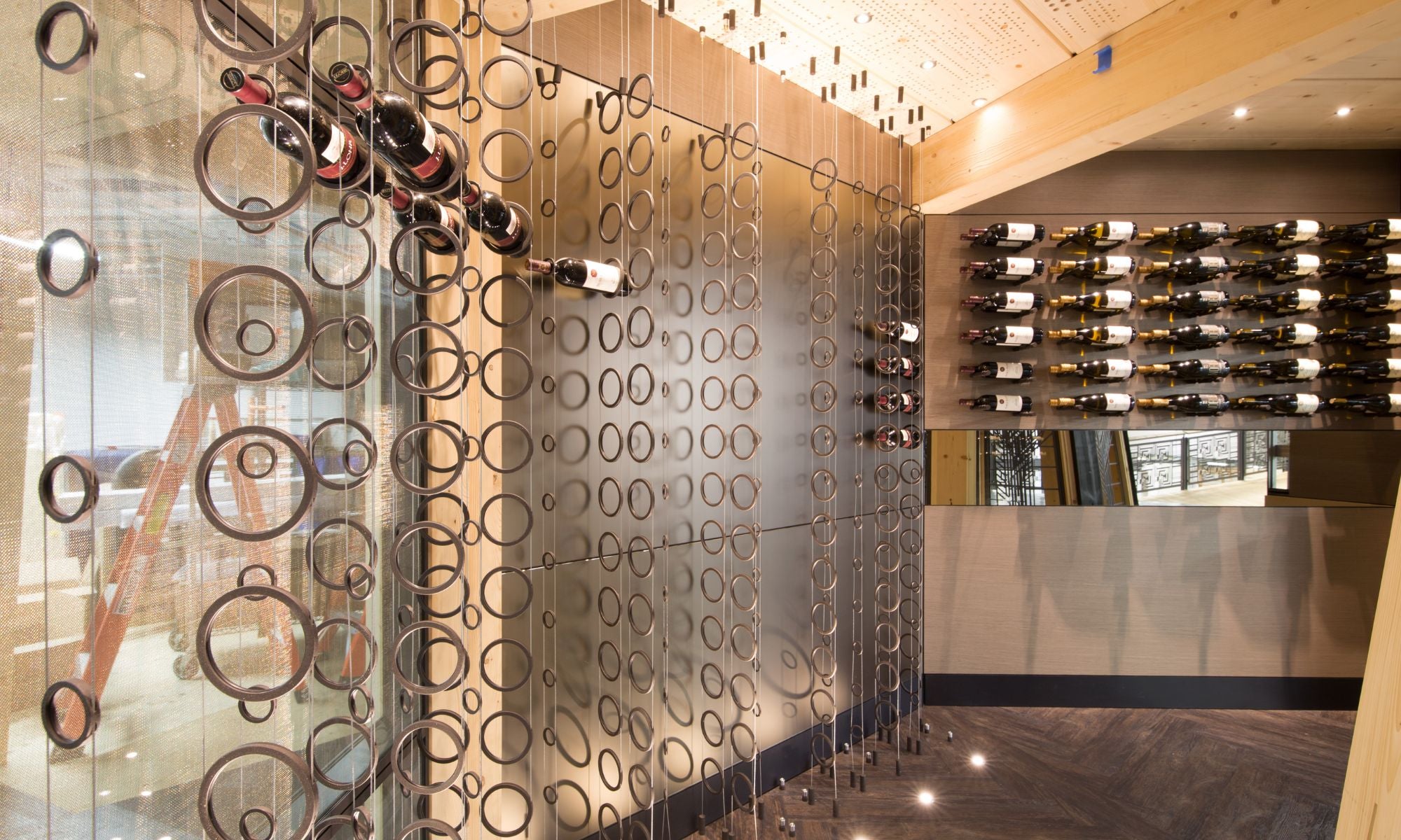 the black Rign cable rack in commercial wine cellar - Genuwine Cellars Reserve